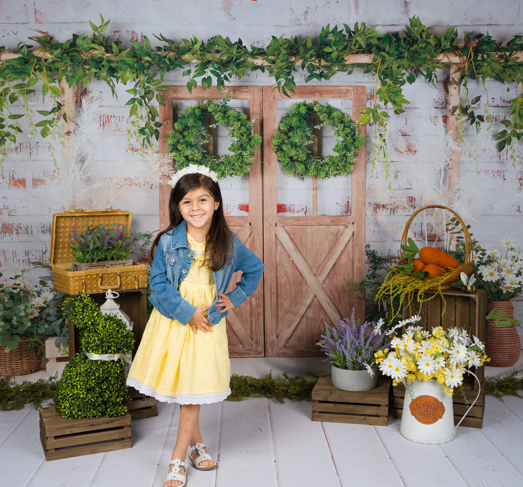 Kate 春の緑の植物の納屋のドアの背景