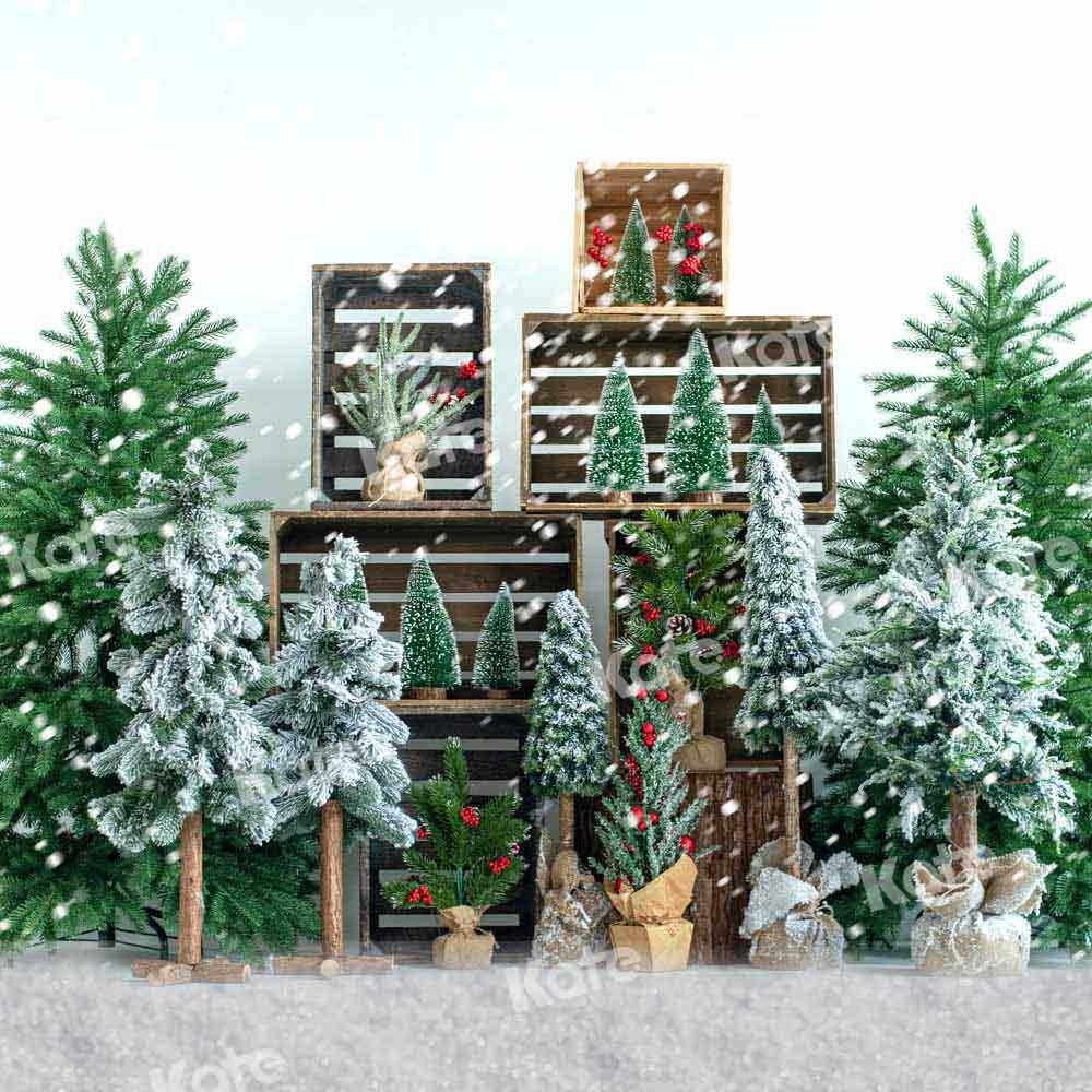 雪の中のKateつのクリスマスツリーの背景